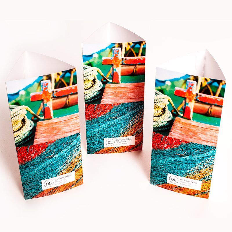 Colourfully vibrant DL Table Talkers.